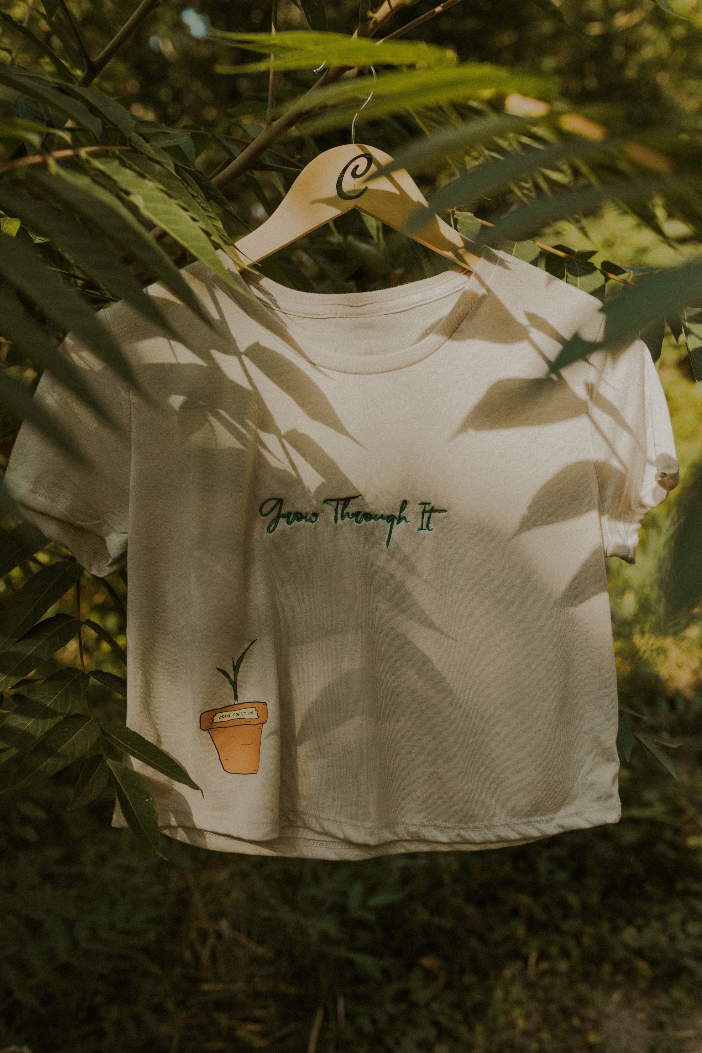 Woman’s Flowy Cropped Growth Tee