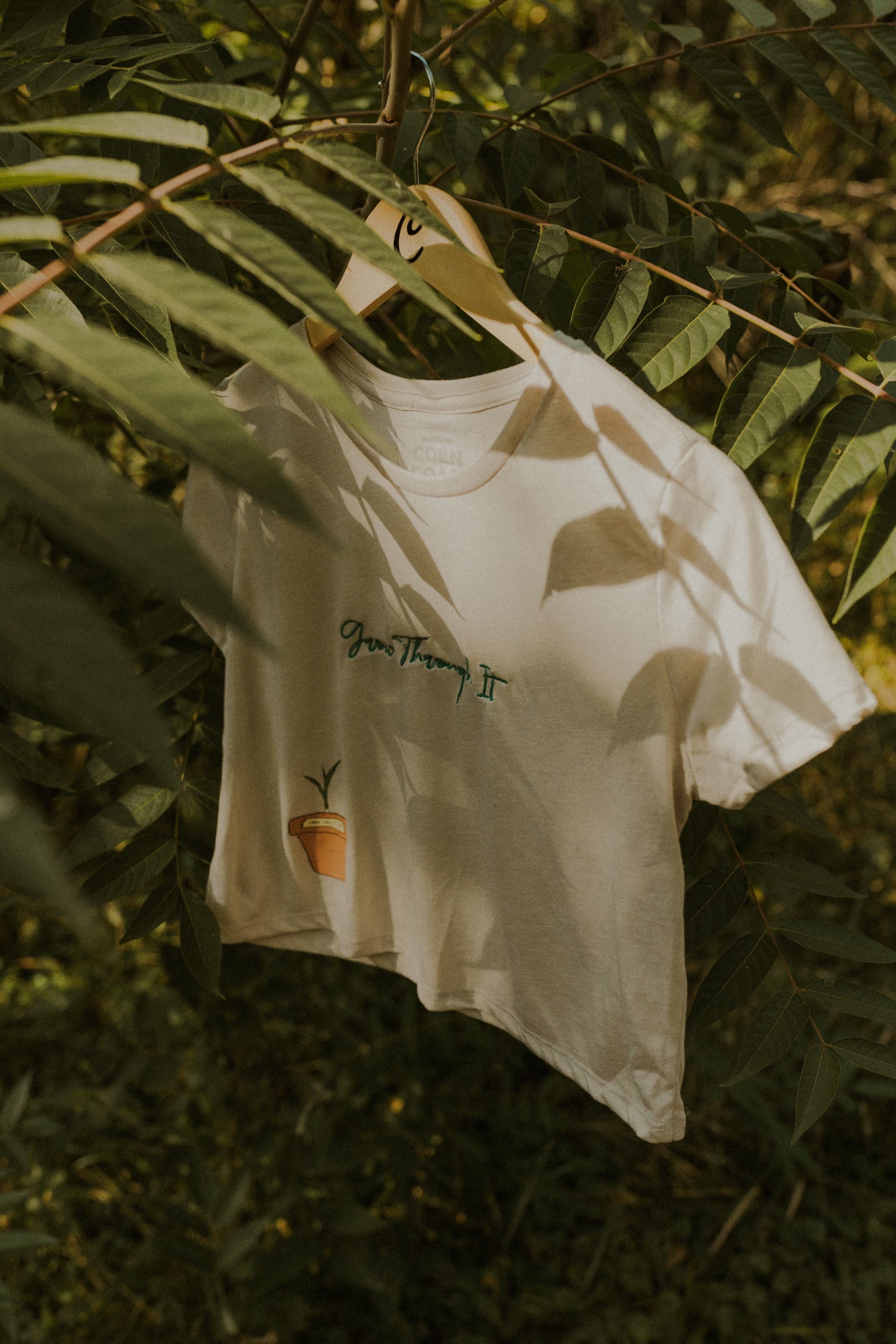 Woman’s Flowy Cropped Growth Tee