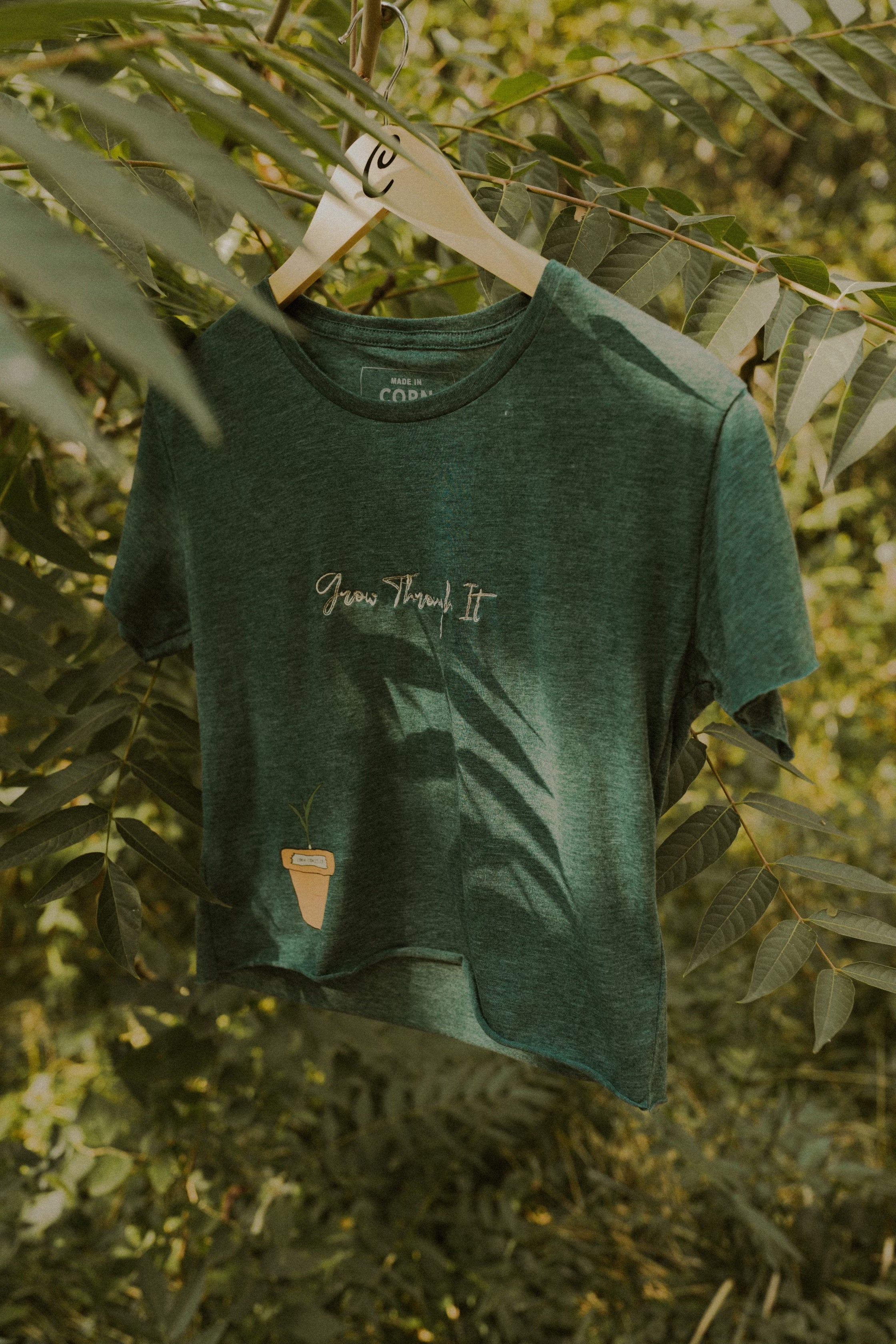 Woman’s Flowy Cropped Growth Tee